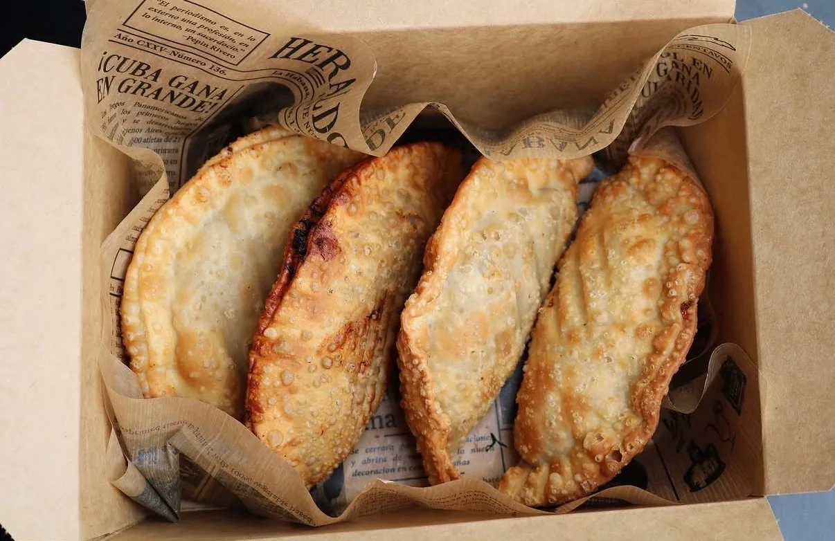 Actual Empanada Sonata take-and-bake pickup box